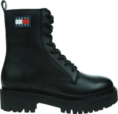 A black lace-up boot with a platform sole, featuring a Tommy Jeans logo patch on the side.