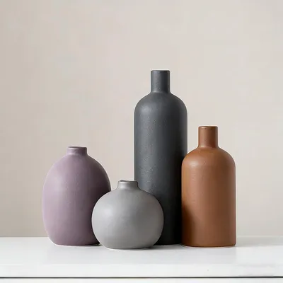 Zdjęcie produktu dla Zestaw czterech ceramicznych wazonów w stylu boho, idealnych do kwiatów i dekoracji