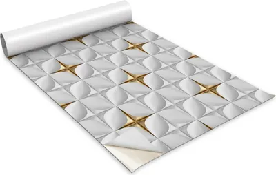 A roll of self-adhesive decorative film with a geometric pattern in white and gold.