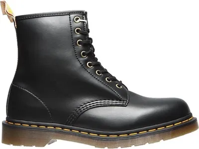 A black Dr. Martens vegan boot shown from the side.