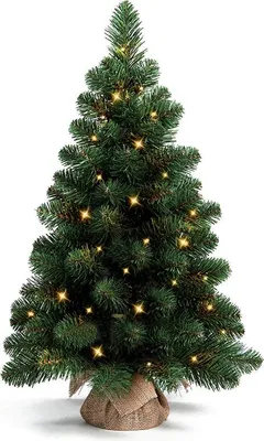 A small artificial Christmas tree with LED lights, standing in a burlap pot.