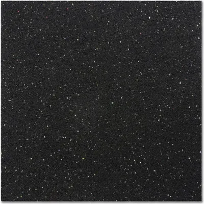 A close-up, top-down view of a black anti-vibration mat with small white flecks.