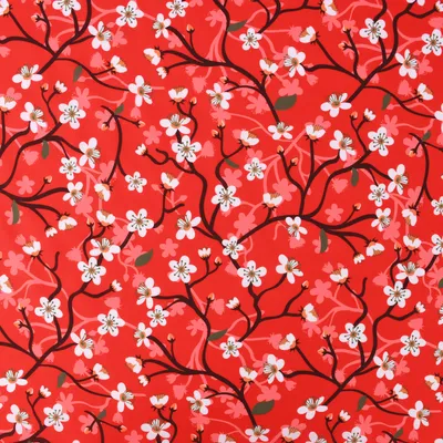 Produktbild von Faschingsstoff Meterware Polyester Kirschblütenranken rot 1,5m