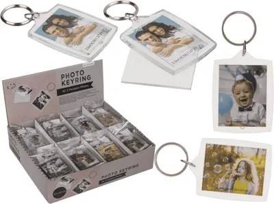 A collage of photo keyrings and a display box of keyrings.