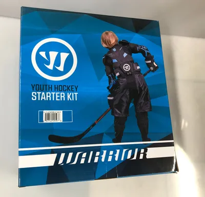 The image shows the front of a Warrior Youth Hockey Starter Kit box, featuring a young hockey player in full gear.