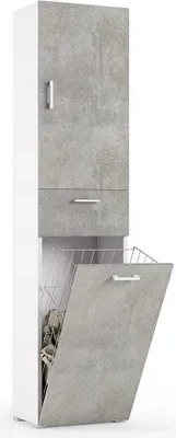 A tall, narrow cabinet with a concrete-look finish on the doors and drawer fronts, and a white body. The bottom door is open, revealing a wire laundry basket inside.
