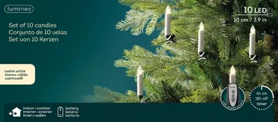 Christmas tree lights shaped like candles, attached to pine branches.