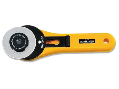 A yellow and black rotary cutter with a silver blade is shown against a white background.