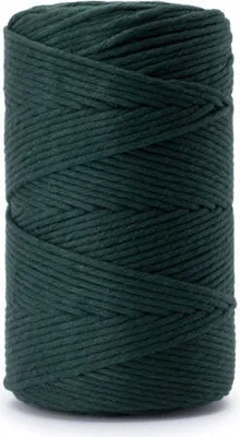A spool of dark green macrame cord.
