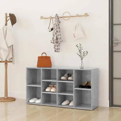 An entryway with a shoe bench, coat rack, and a wall-mounted shelf.