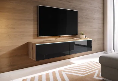 A modern living room with a wall-mounted TV and media console.