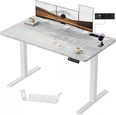 Imagen del producto de Escritorio de altura ajustable de 140x60 cm con toma de corriente