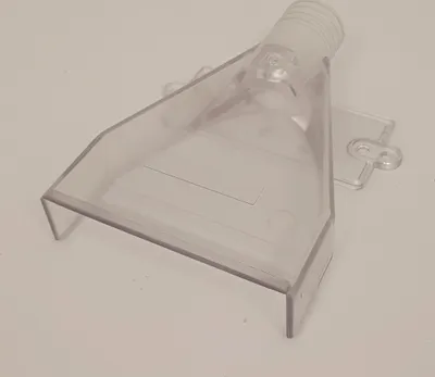 A clear plastic vacuum cleaner attachment is shown on a white background.