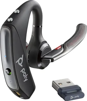 A black and silver Poly Voyager 5200 headset and its USB dongle are shown against a white background.