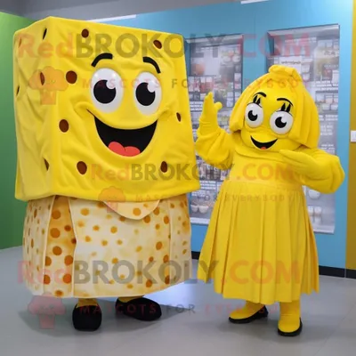 Immagine prodotto di Personaggio in costume della mascotte REDBROKOLY Lasagna gialla vestito con un abito midi e fasce da smoking