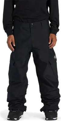 A person wearing black snow pants.