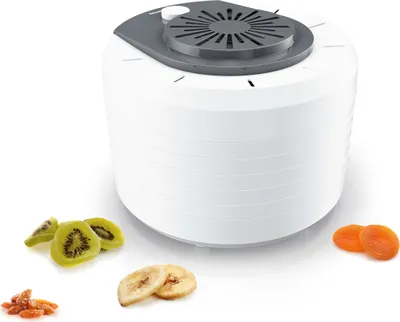 A white food dehydrator with a gray top, surrounded by dried fruits.