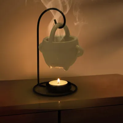 Productafbeelding van Aroma lamp van keramiek - Aroma diffuser met theelichthouder en lepel - Aroma diffuser in hangende mandstijl - Wit