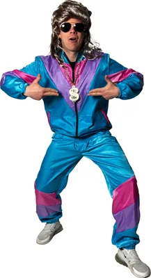 A man wearing an 80s-style tracksuit and wig, posing against a white background.