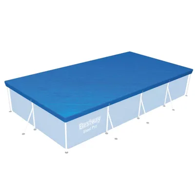 A rectangular swimming pool covered with a blue tarp.