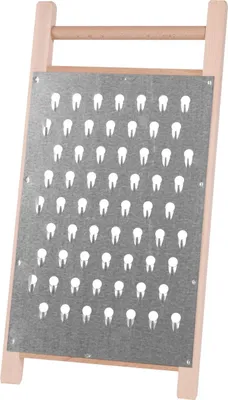 A close-up, straight-on shot of a grater with a wooden frame and a metal grating surface.