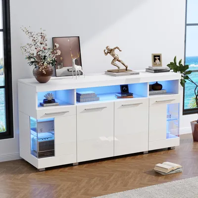 A modern white sideboard with LED lighting is displayed in a living room setting.