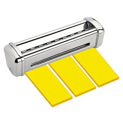A chrome pasta maker attachment with three yellow rectangular pieces of pasta emerging from it.