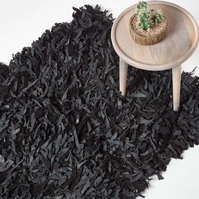 Produktbild von HOMESCAPES Lederteppich Dallas, schwarz, 120 x 180 cm