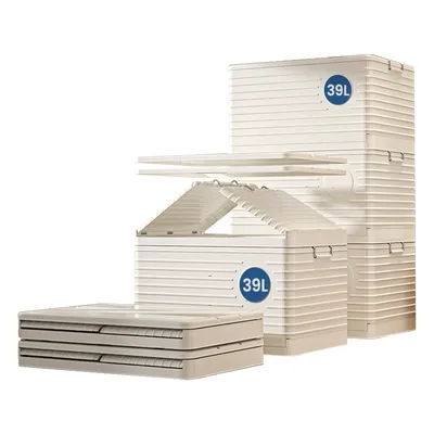 A stack of white plastic storage boxes of varying sizes, with one box shown folded flat.