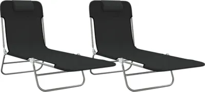 Two black foldable lounge chairs with steel frames and headrests are shown against a white background.