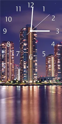 Produktbild von Wallario Design Wanduhr bedruckt, Größe 30 x 60 cm, Motiv: Tokyo- Skyline bei Nacht