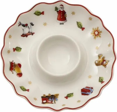 A Christmas-themed egg cup with various festive illustrations.