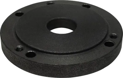 A black metal flange with a central hole and mounting holes around the perimeter.