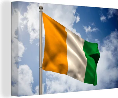 Produktbild von OneMillionCanvasses® - Leinwandbilder - 140x90 cm, Hissende Flagge der Elfenbeinküste, Wandbilder Kunstdruck Wanddekoration