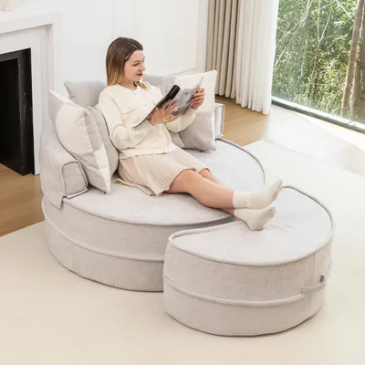 Immagine prodotto di Divano rotondo con 5 cuscini e poggiapiedi, ideale per il soggiorno e la camera da letto, colore grigio