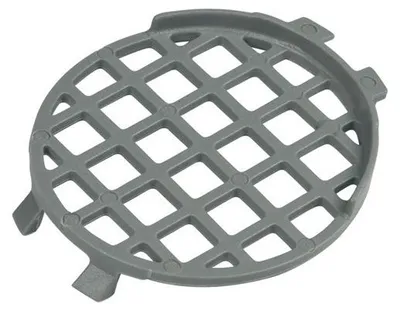 A gray dishwasher filter grate with a grid pattern and three legs.