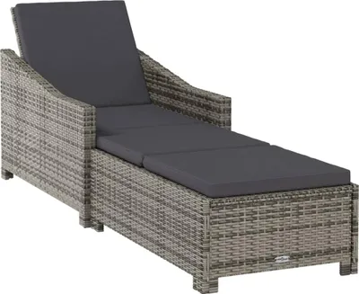 A single outdoor lounge chair with a dark gray cushion, shown from a side-diagonal angle against a white background.