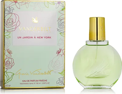 A perfume bottle and its box are displayed side-by-side against a white background.