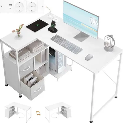 A white L-shaped desk with computer equipment and storage.