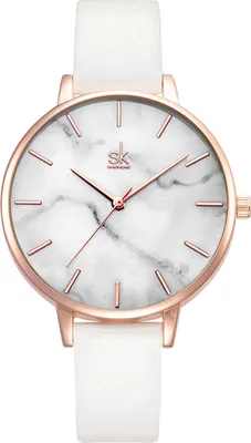 A close-up studio shot of a women's wristwatch.