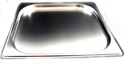 A close-up, slightly angled view of an empty stainless steel food pan, often referred to as a Gastronorm container.