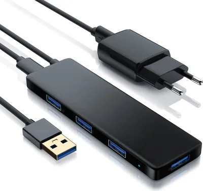 A black USB hub with multiple ports and a power adapter, presented on a white background.