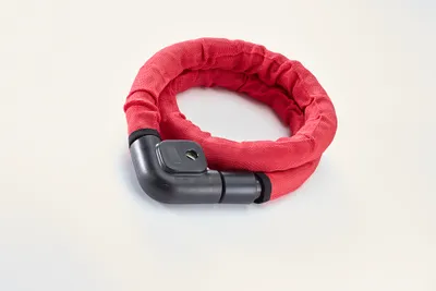 Imagen del producto de Candado para bicicleta Mottez, tipo cable con funda de tela, fabricado en Francia, Unión Europea, longitud 106 cm