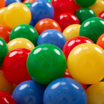 A close-up view of a pile of colorful plastic balls.
