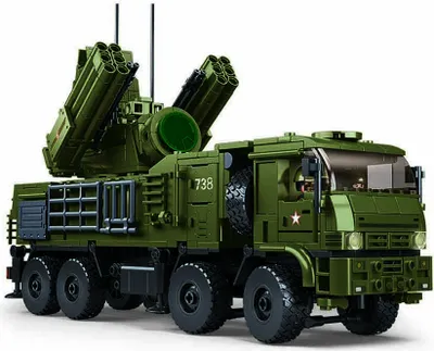 A green military vehicle model with missile launchers.