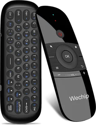 Two remote controls, one with a keyboard and the other with navigation buttons, are placed side-by-side on a white background.
