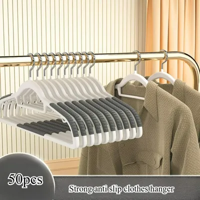 Produktbild von 50er Set Kleiderbügel - Rutschfeste Kleider- und Garderobenbügel - Platzsparend - 360° drehbarer Haken - Hosen- und Krawattenhalter - Kunststoff - Grau