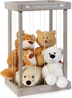 A wooden box filled with stuffed animals.