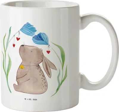Produktbild von Mr. & Mrs. Panda Kaffeetasse Hase Blume - Weiß - Geschenk, Hoffnung, Pott, Becher, Ostern, Tasse, Bedruckte, Schwangerschaft, Geburtstag, Träume, Kindergeburtstag