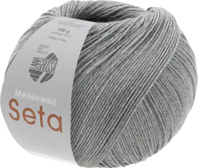 A ball of grey yarn with a label.